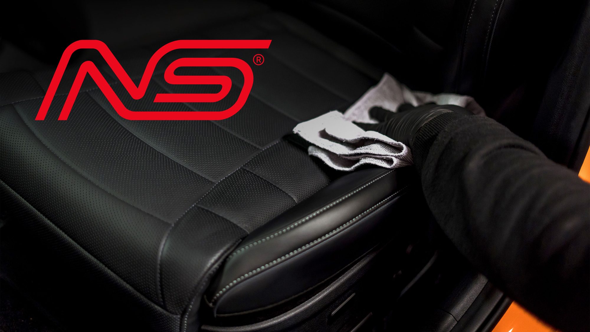 Interior care: leather car seat wiped with a microfibre cloth